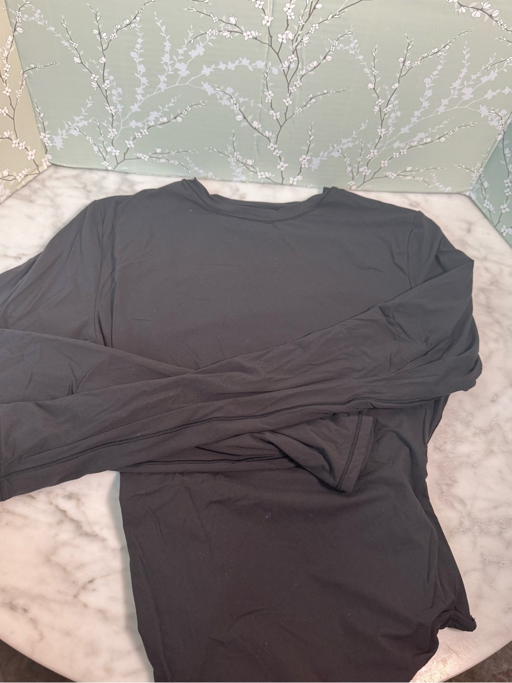 SKIMS Long-Sleeve One-Piece Bodysuit in BLACK
